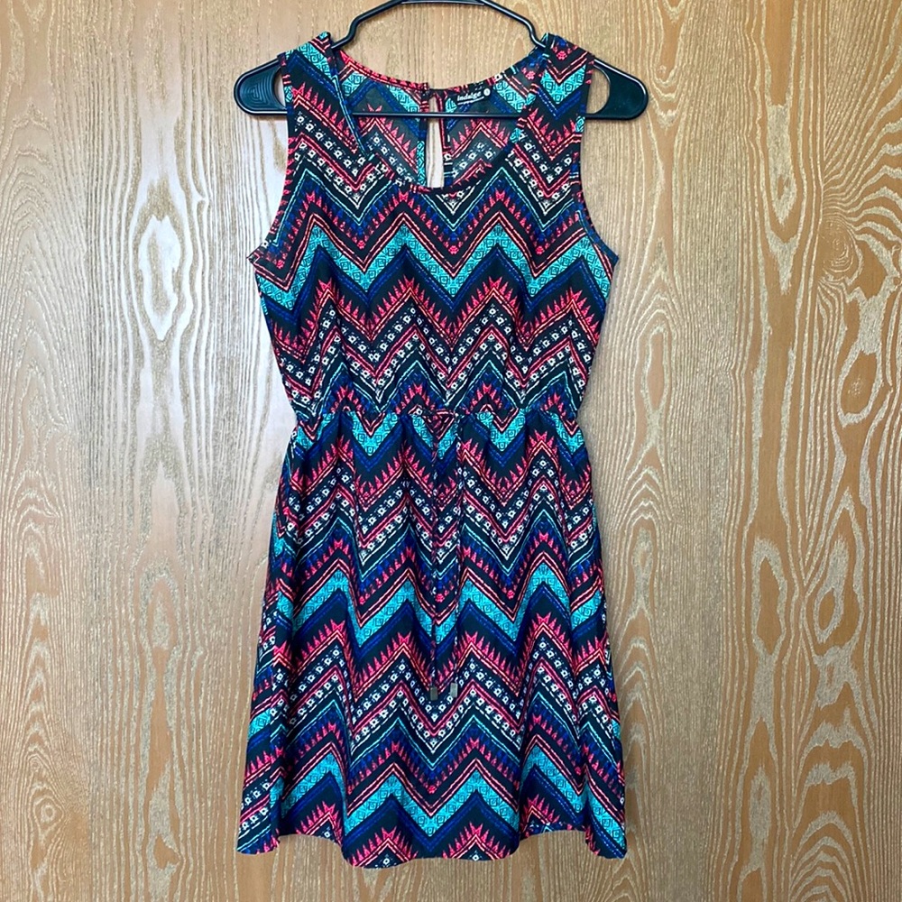 Black dress with colorful chevron design